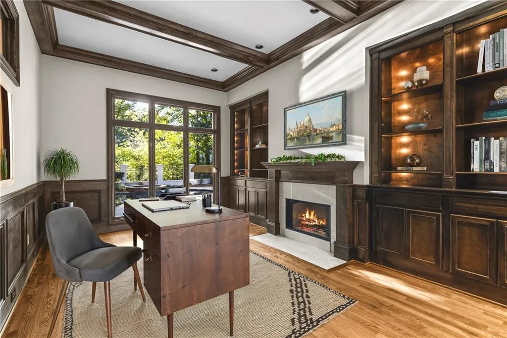 Beautiful office/library with extraordinary view of pool & spa. Fireplace and fabulous lighting