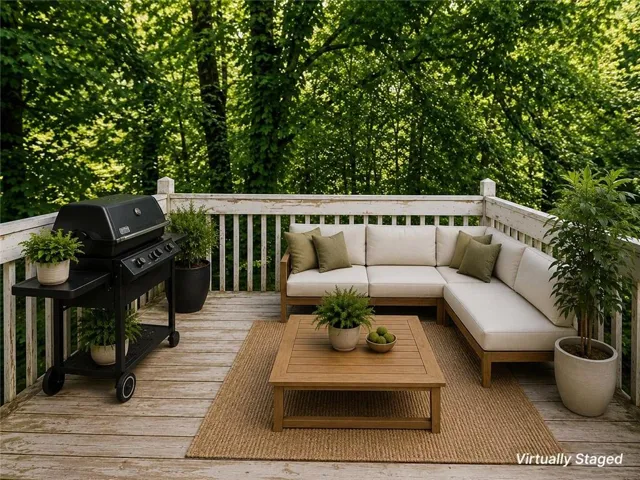 Wood deck with white railing