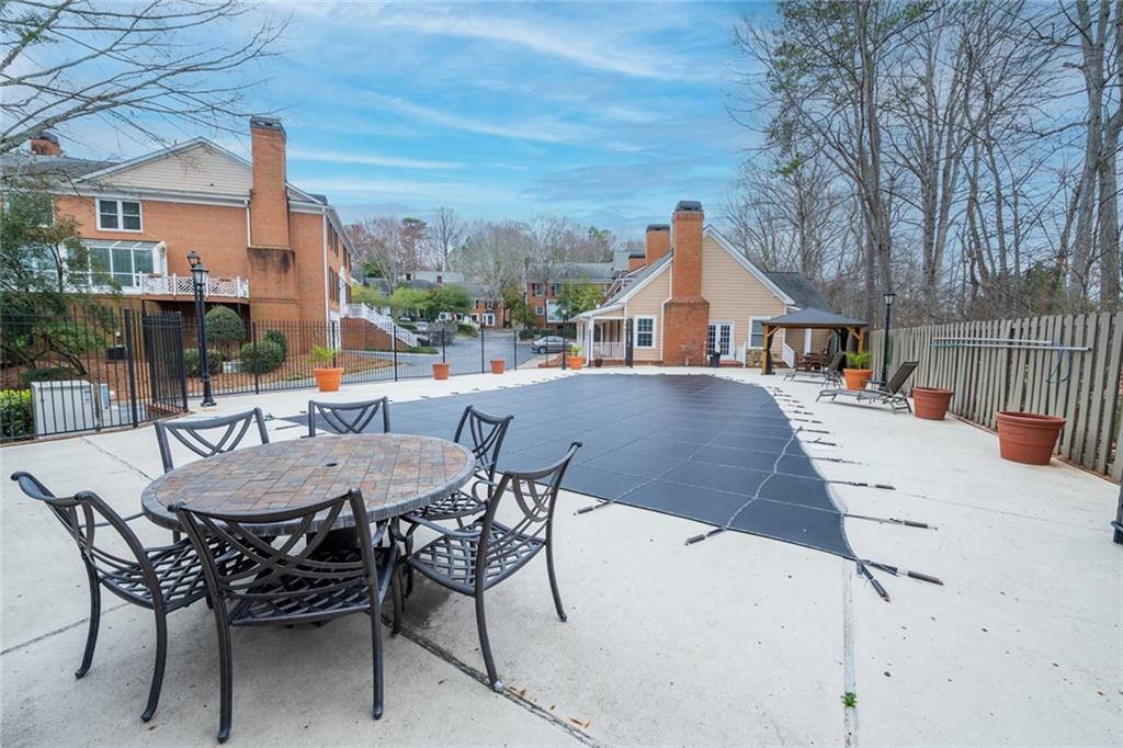 View of swimming pool with a patio