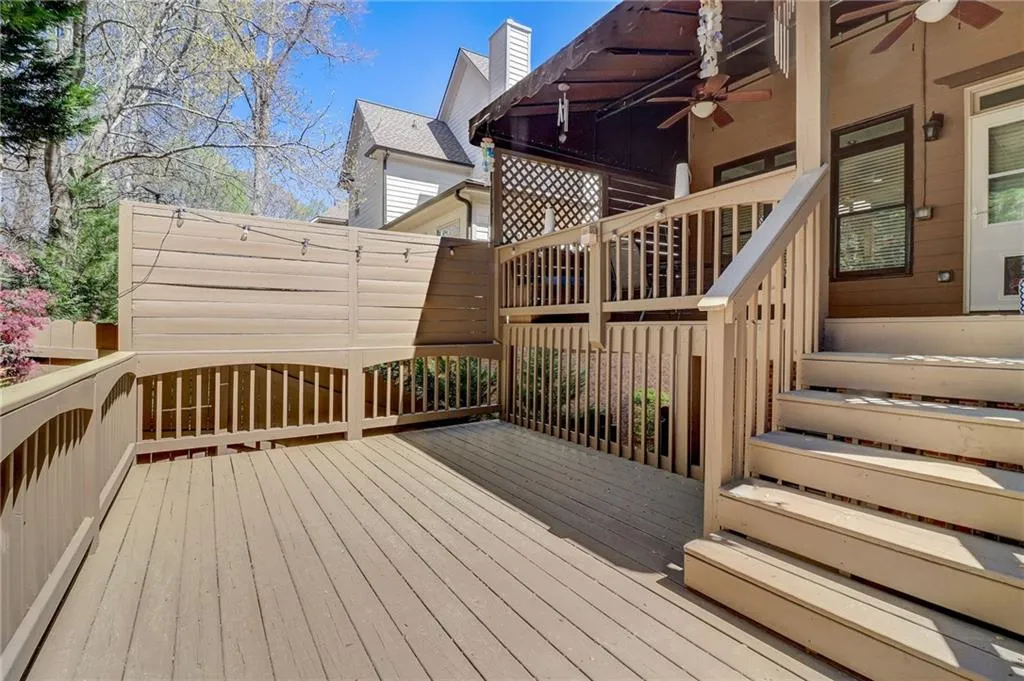 Wooden terrace with ceiling fan