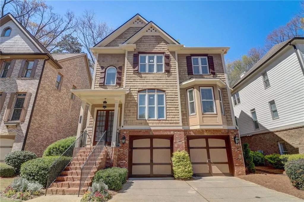 View of front of home featuring a garage
