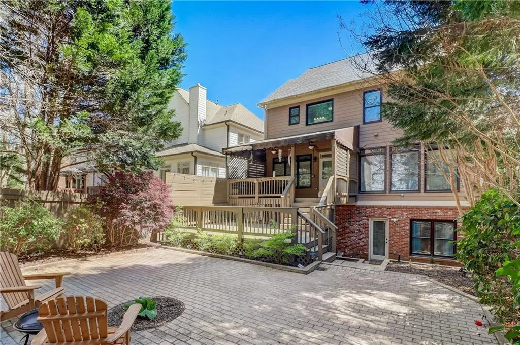 Back of house with a patio area