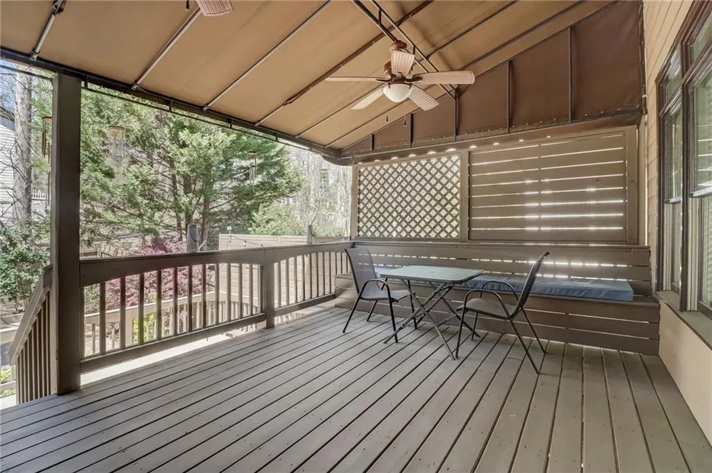 Wooden terrace with ceiling fan