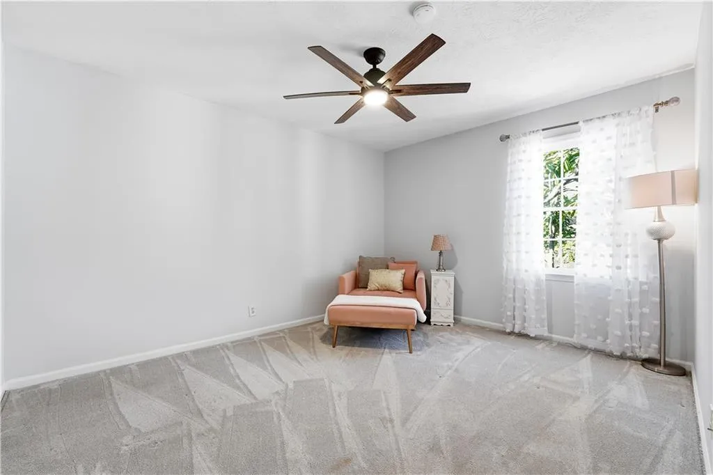 Secondary bedroom with walk in closet