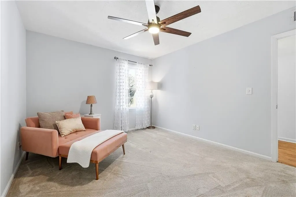 Secondary bedroom with walk in closet