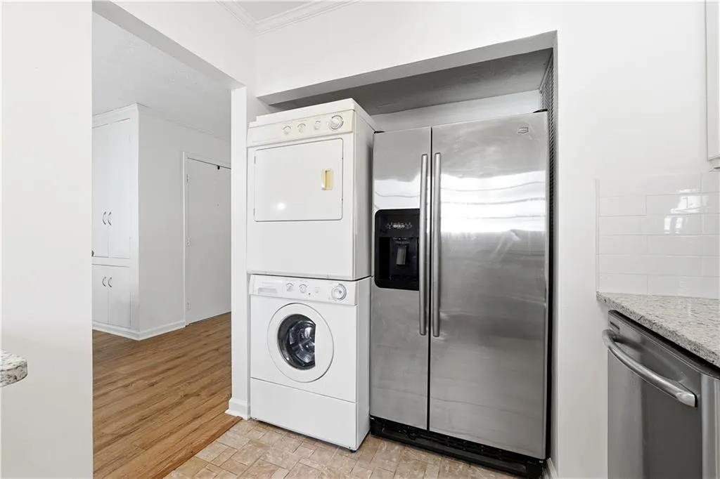stainless steel refrigerator and stackable washer and dryer