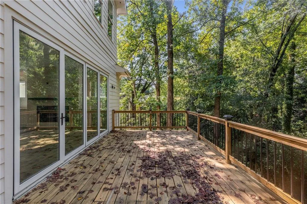 Deck with view of scattered trees