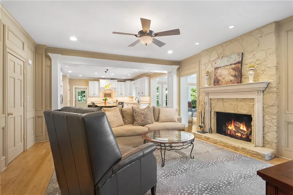 Cozy Fireside Den Open to Kitchen