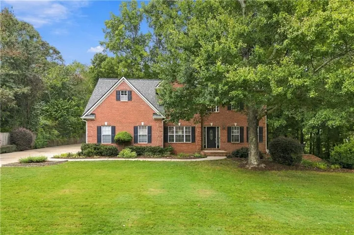 Beautiful brick home with mature landscaping