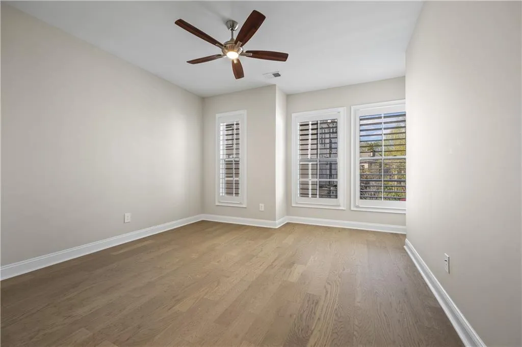 3rd bedroom upstairs, a ceiling fan, new finished floors
