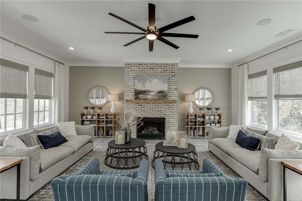 Gorgeouos main level with central fireplace.