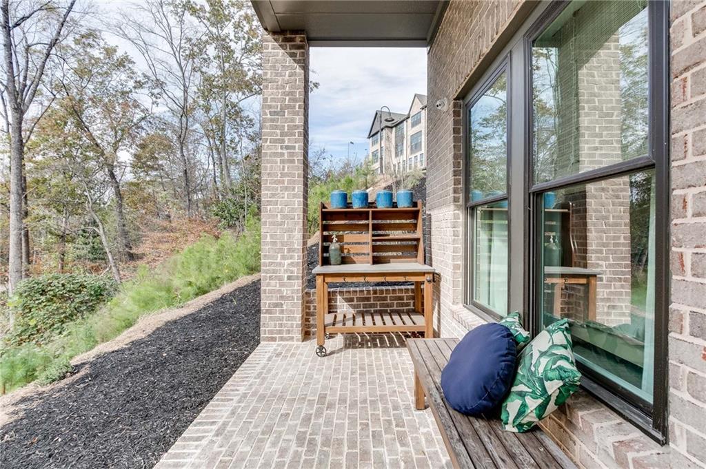 Walk of of bonus room on basement level to patio overlooking the community park.
