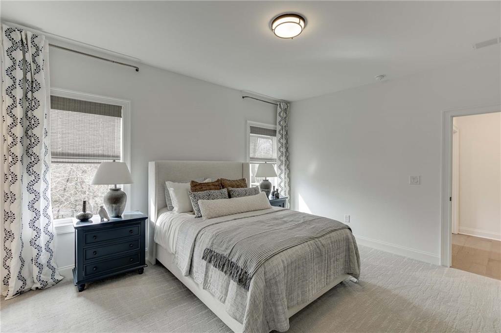 Upstairs Guest Bedroom with private ensuite bath.