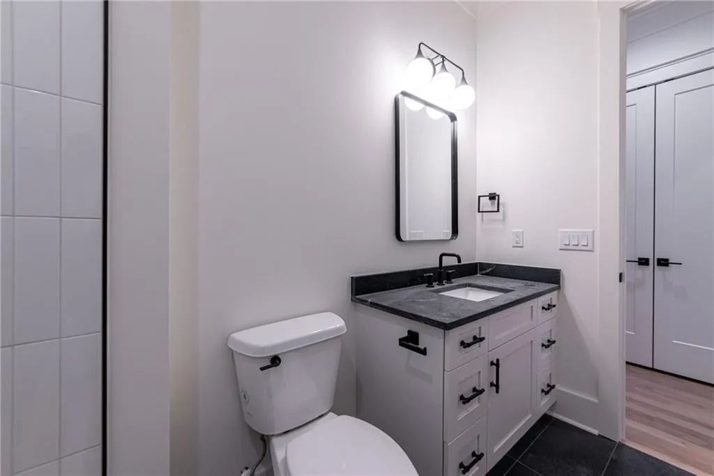 Bathroom featuring vanity and tile patterned floors