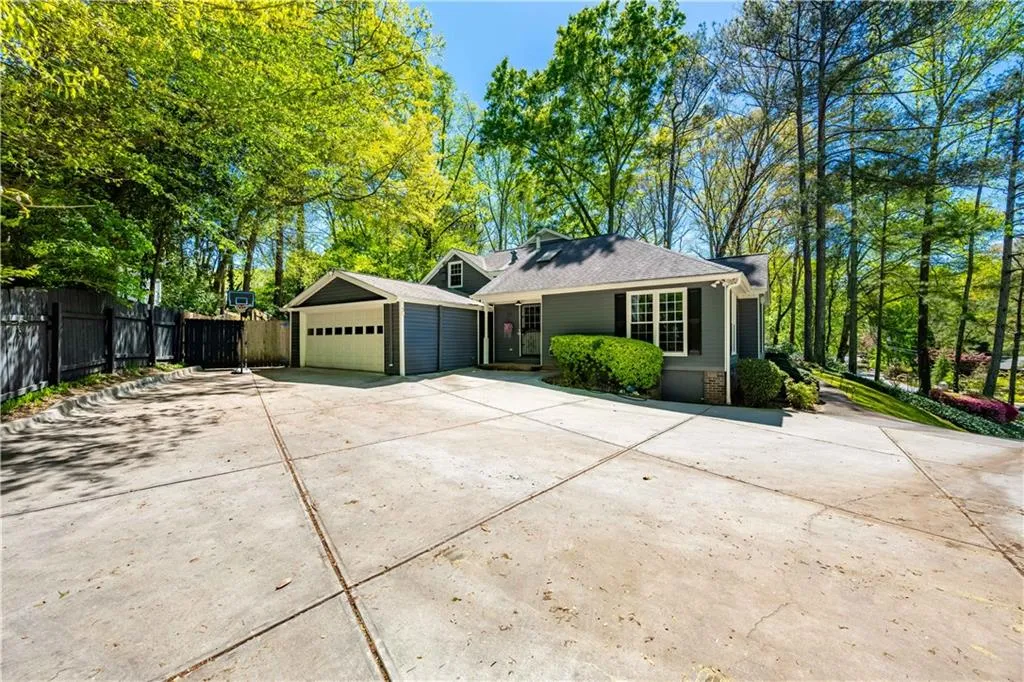Ranch-style house featuring a garage