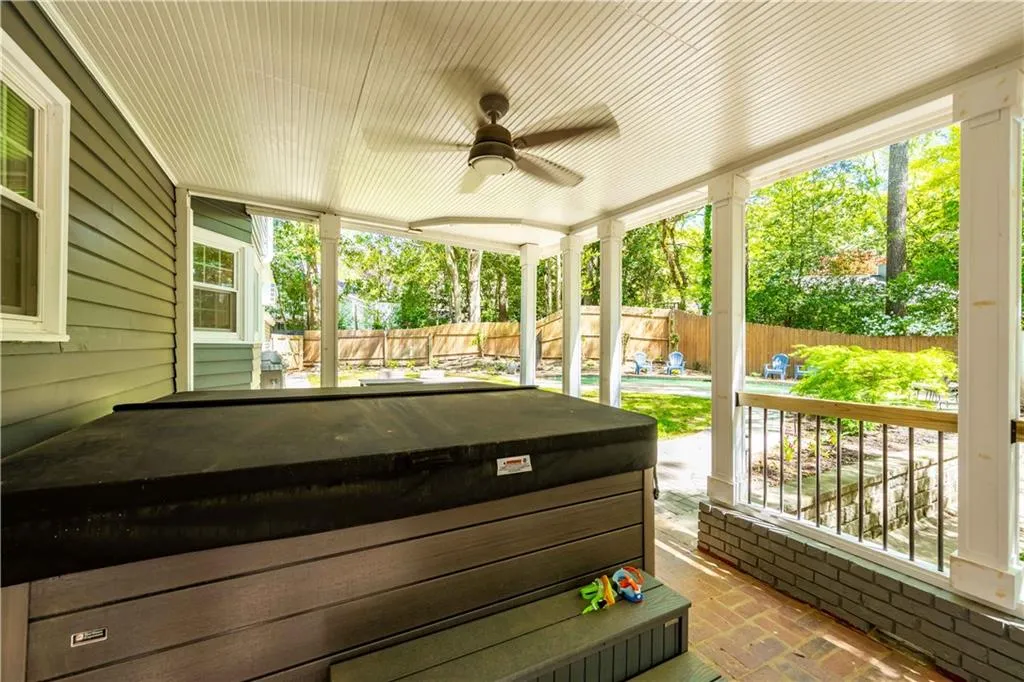 Sunroom / solarium with ceiling fan, a healthy amount of sunlight, and pool table
