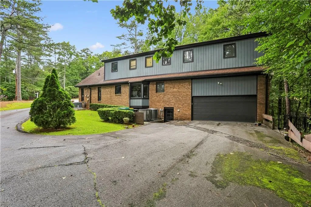 2 car - kitchen level
parking pad large enough for basketball goal and trampoline