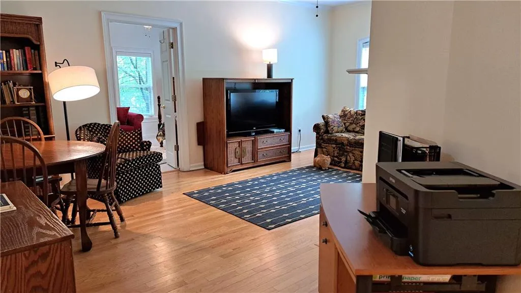 Looking across living room from foyer. You can see the eating area in this photo.