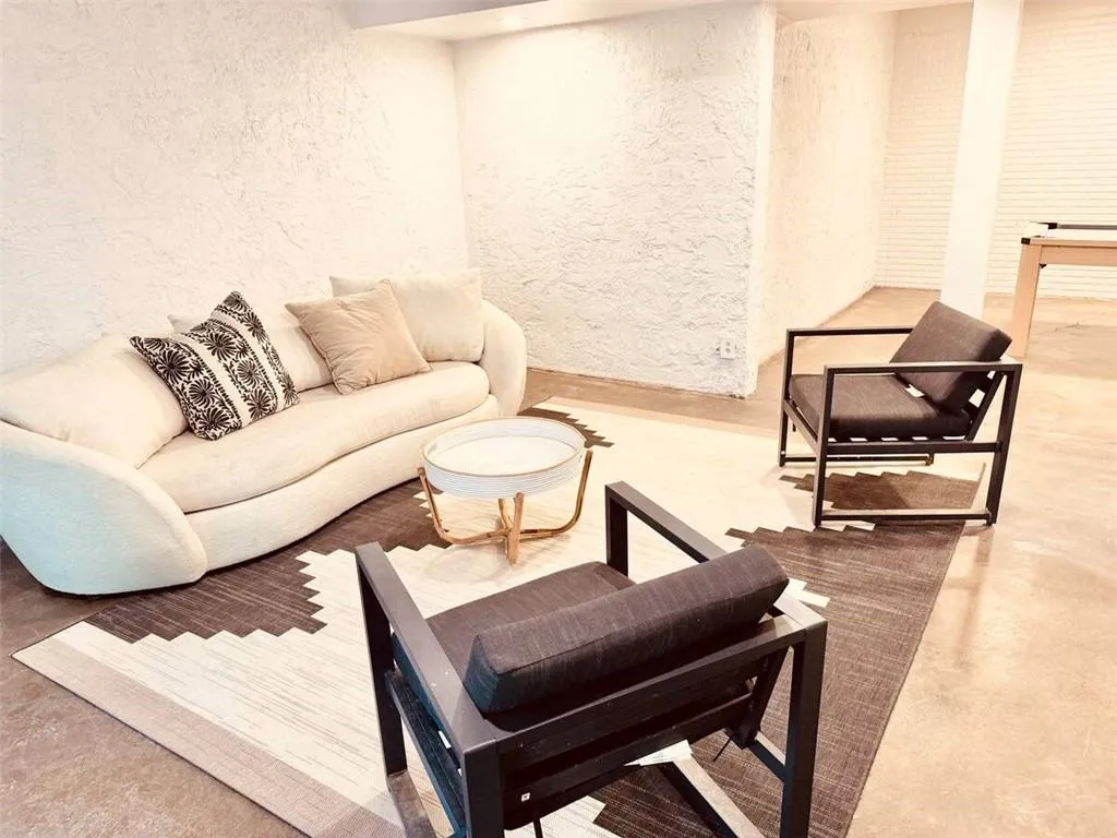 Living area with finished concrete flooring