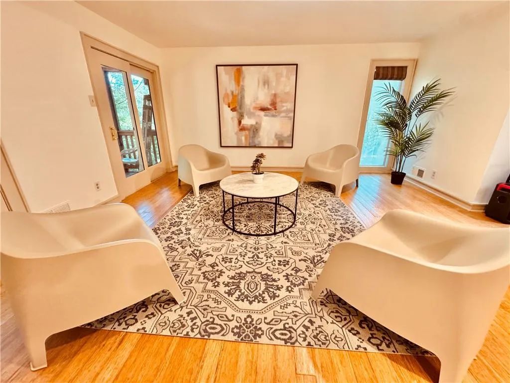 Living area with wood finished floors