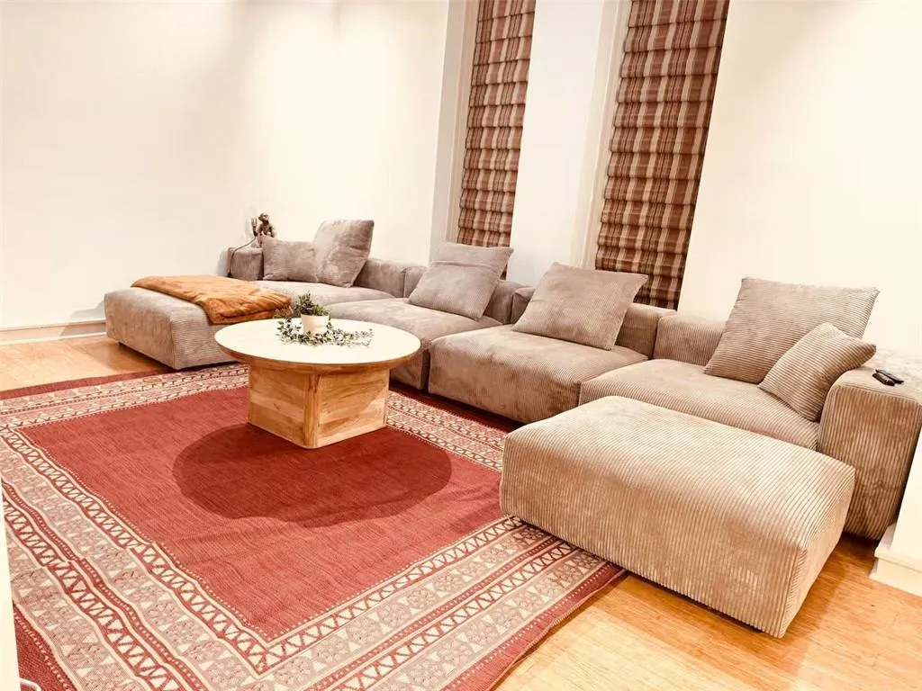Living area with wood finished floors