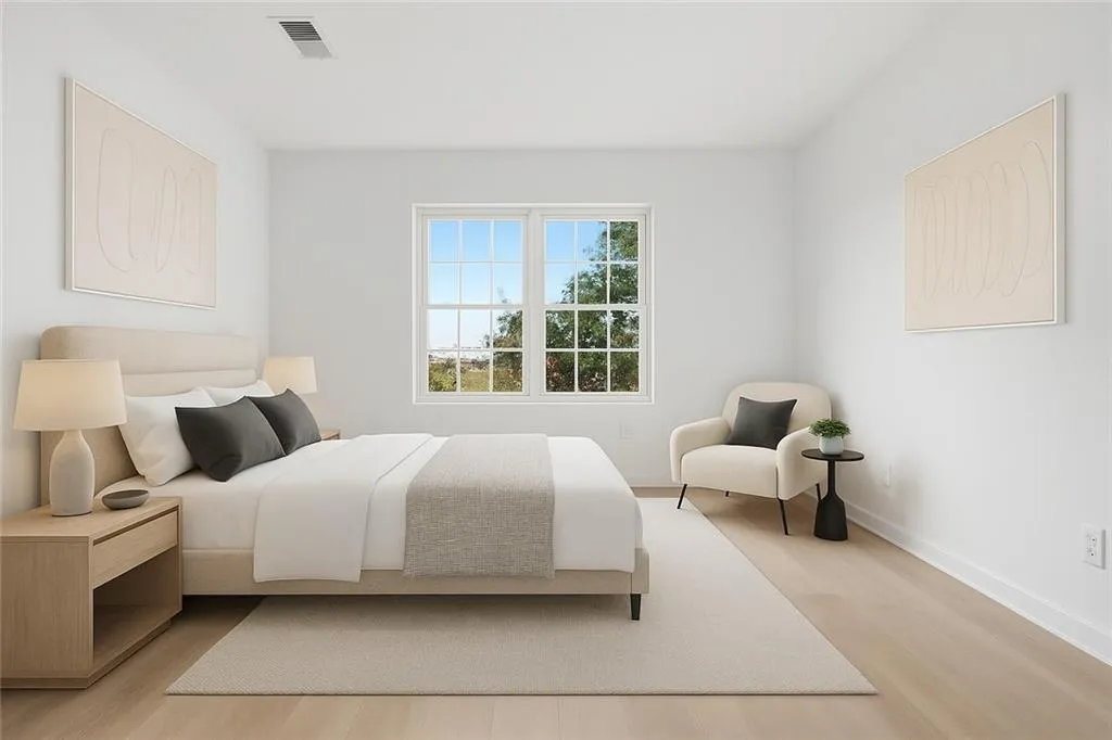 Bedroom featuring light wood-style floors