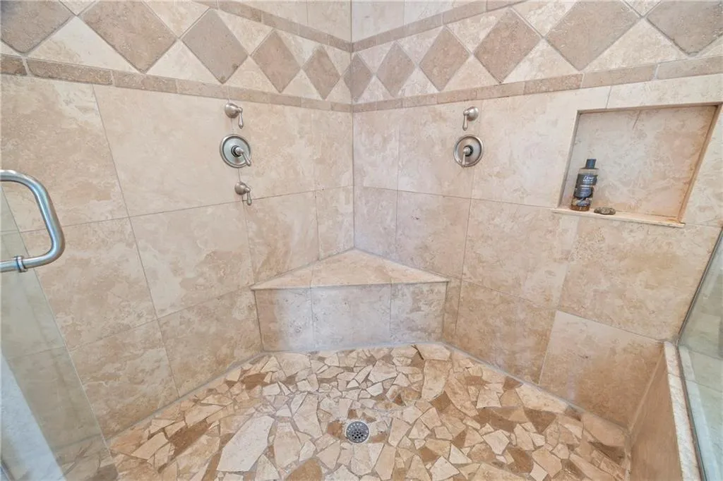 Bathroom with a tile shower