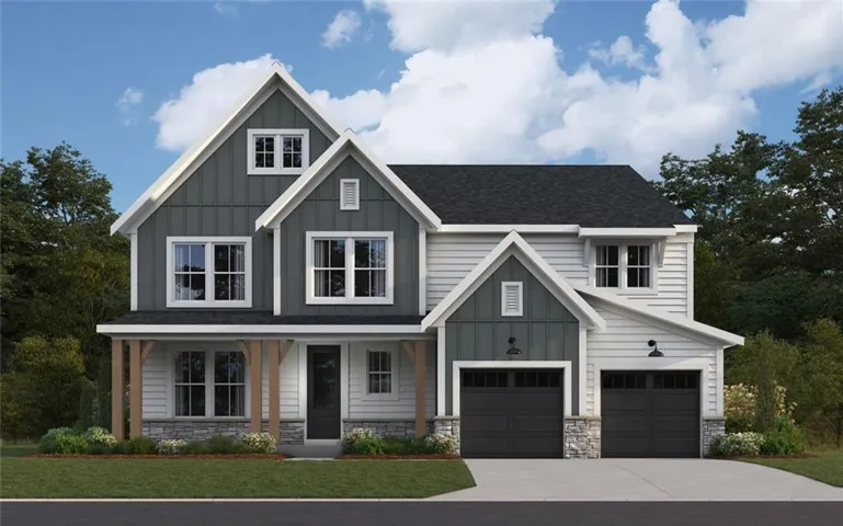 Contemporary craftsman-style residence featuring a dark gray shingle roof, two-tone siding, and a stone accent foundation
