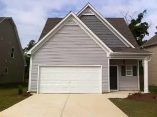 Gable roofline with dark shingle accents