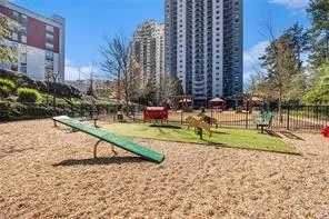 View of community featuring a dog friendly area