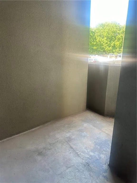 Spare room with concrete flooring