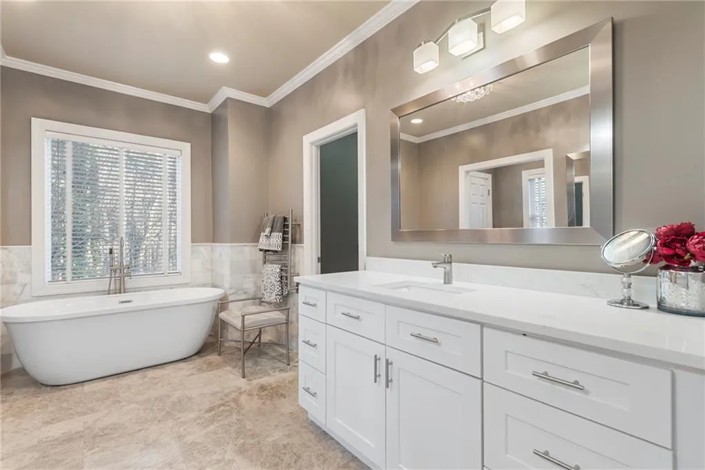 Heated floor and heated towel bar keeps this bathroom cozy!
