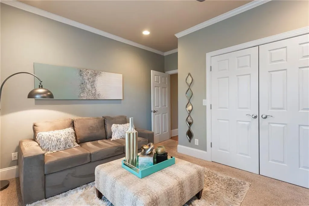 This secondary main level bedroom is set up as the ideal home office.