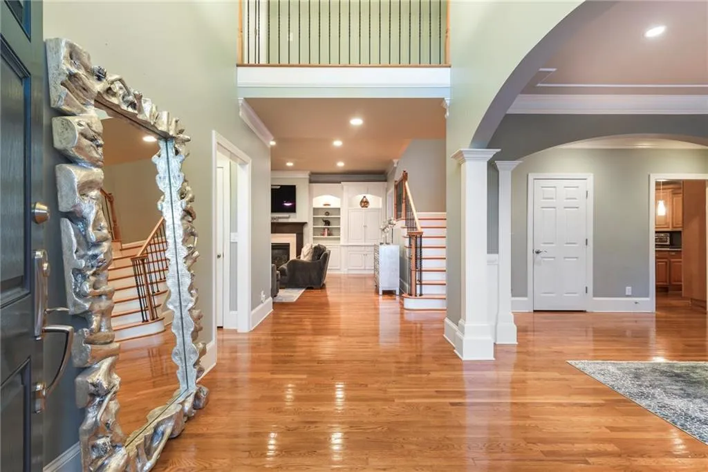 Two story, wide open entry foyer provides a grand entrance