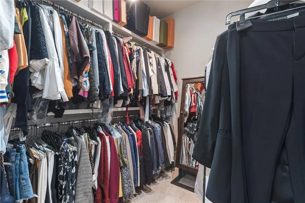 This huge closet is split in two...ideal for two people or two seasons!