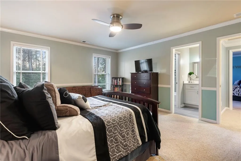 One of two upstairs bedrooms share the updated Jack & Jill bath