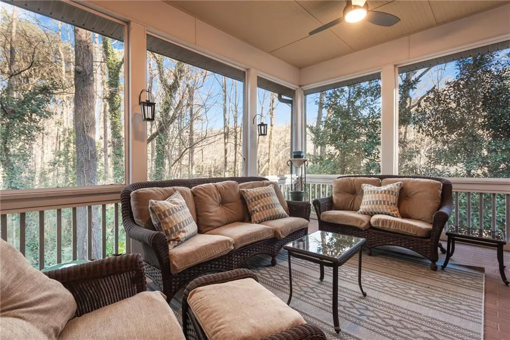 Beautiful screened porch off the living room expands living and entertaining space!
