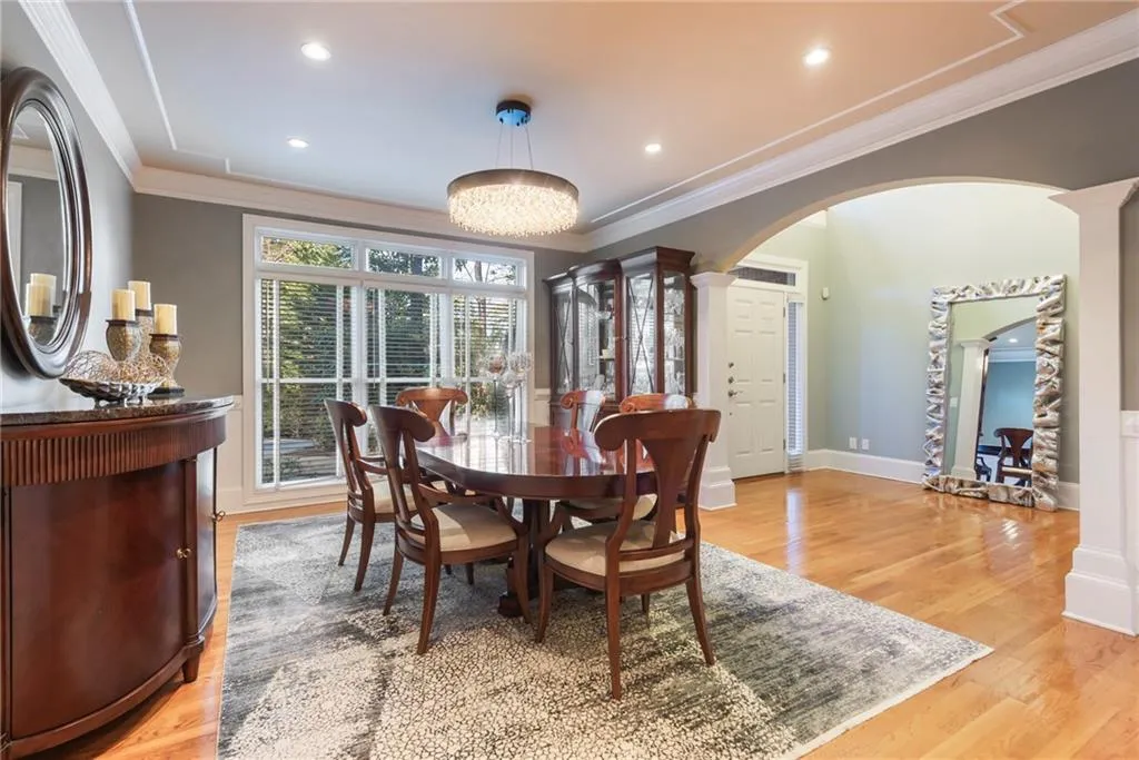 Beautiful dining room with elegant lighting...