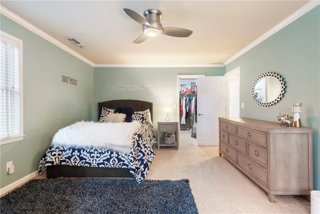 Upstairs bedroom with spacious walk-in closet