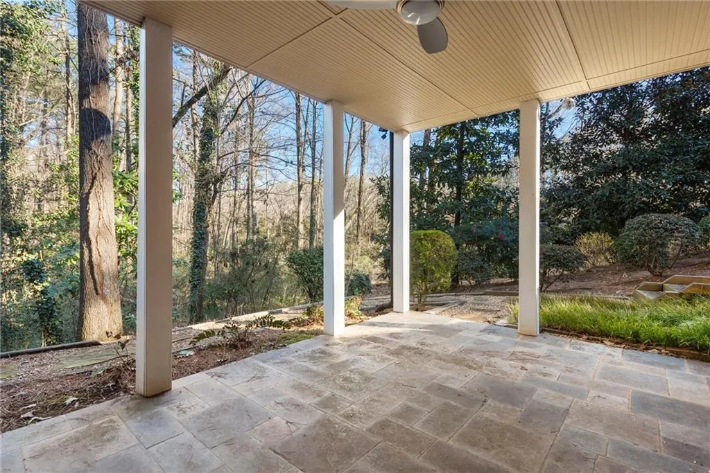 Just off the terrace level living room is a covered, stone patio - great for outdoor enjoyment.
