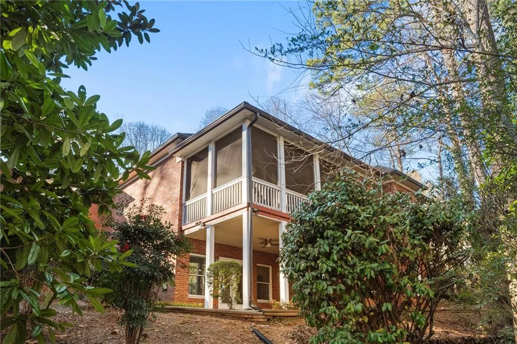 Private screened porch and side patio.