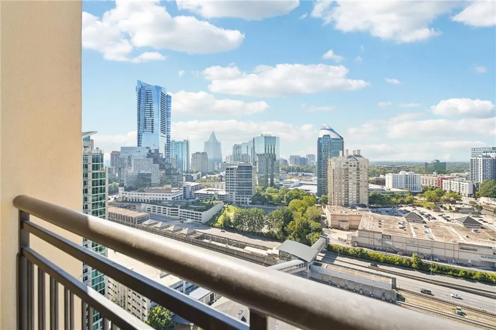 Balcony featuring a view of skyline