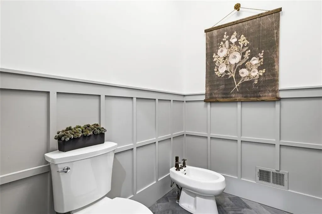 Primary Water Closet with bidet.