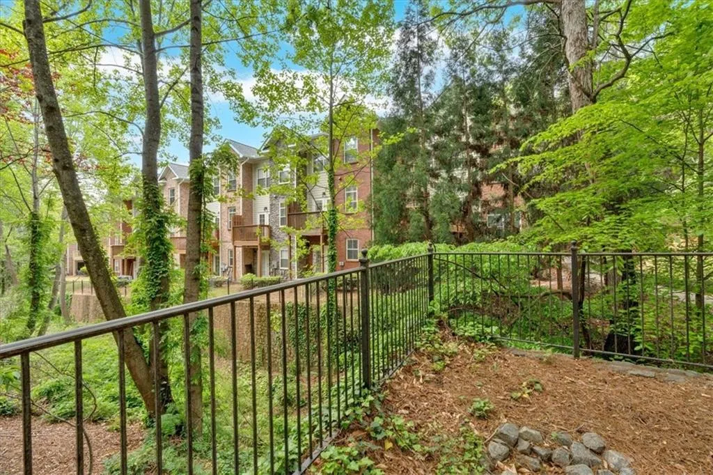View of yard featuring fence