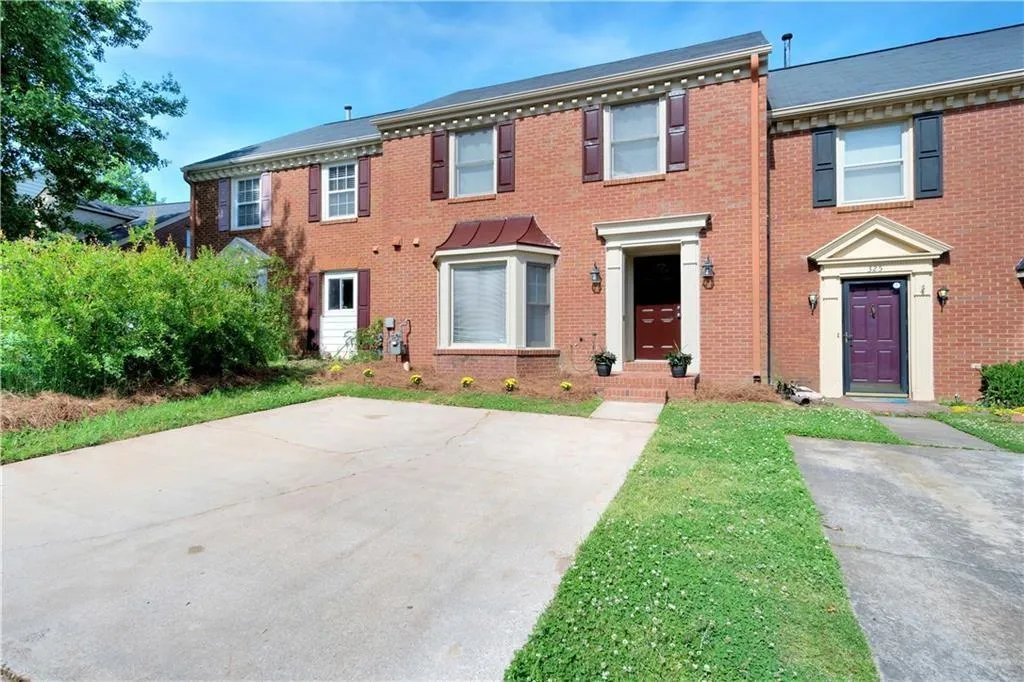 View of front of home with brick siding