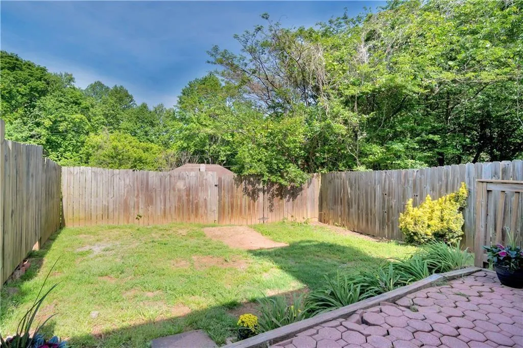 View of yard featuring a fenced backyard