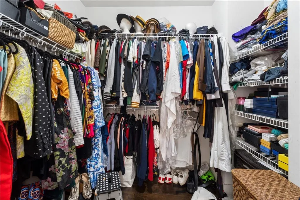 Spacious closet featuring wood finished floors
