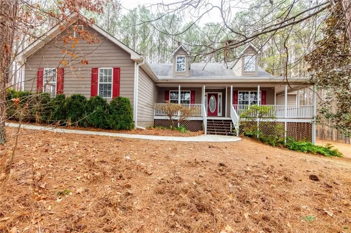 View of front of home featuring covered porch