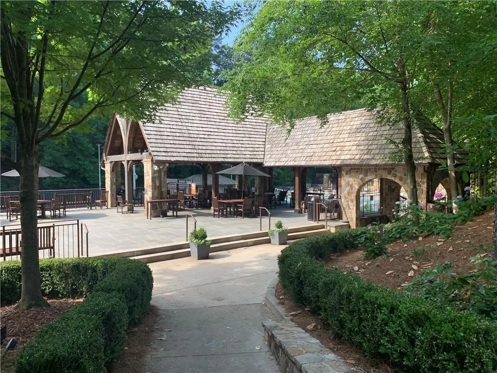 Brookwood Hills clubhouse nestled among mature trees