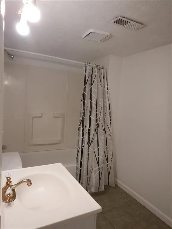 Full bath in basement.